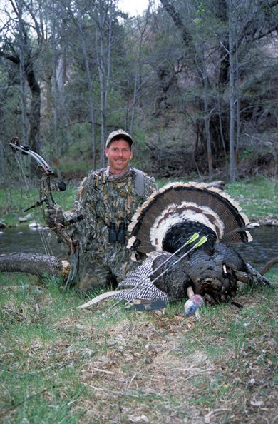 Hunter with Arrowed Turkey